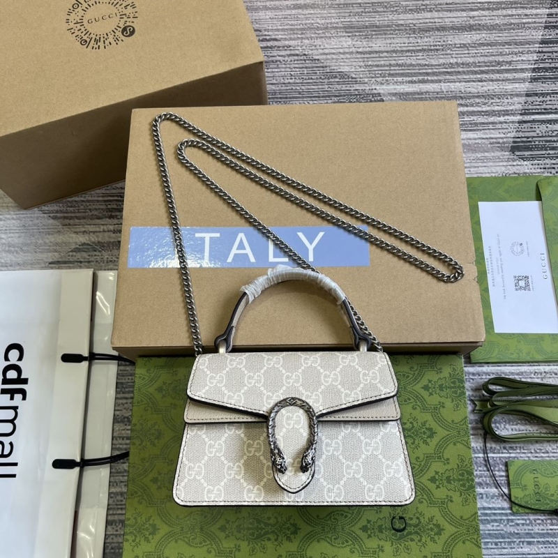 G*u*i top handle bags